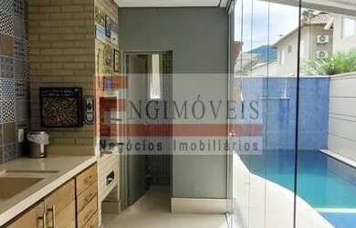 Imagem: A casa em condomínio possui 4 Dormitórios, 4 Banheiros, 2