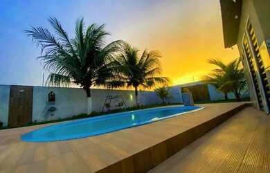 Imagem: A casa possui 4 Dormitórios, 4 Banheiros, 5 Vagas na garagem