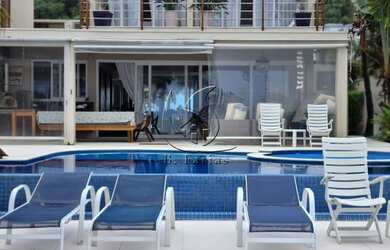 Imagem 6: Sobrado frente ao mar com 5 suítes piscina e sauna privativos