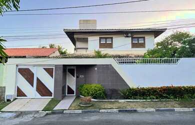 Imagem: A casa possui 4 Dormitórios, 4 Banheiros, 3 Vagas na garagem