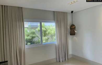 Imagem: A casa possui 4 Dormitórios, 5 Banheiros, 5 Vagas na garagem