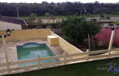 Imagem: A casa em condomínio possui 5 Dormitórios, 5 Banheiros, 5