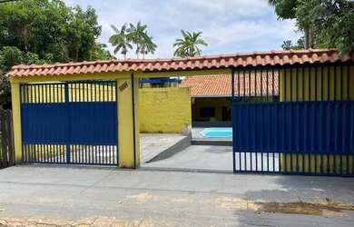 Imagem: A casa possui 2 Dormitórios, 2 Banheiros, 3 Vagas na garagem