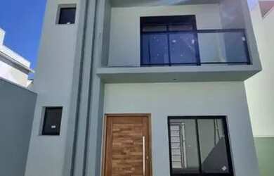 Imagem: A casa possui 3 Dormitórios, 2 Banheiros, 2 Vagas na garagem