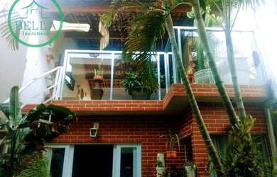 Imagem: A casa possui 5 Dormitórios, 4 Banheiros, 250m² de Área e