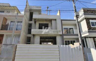 Imagem: A casa em condomínio possui 3 Dormitórios, 3 Banheiros, 2