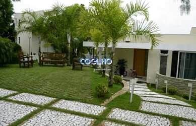 Imagem: A casa em condomínio possui 5 Dormitórios, 5 Banheiros, 3