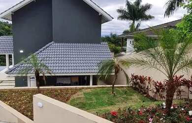 Imagem: A casa em condomínio possui 4 Dormitórios, 4 Banheiros, 5