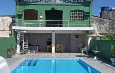 Imagem: A casa possui 5 Dormitórios, 5 Banheiros, 4 Vagas na garagem