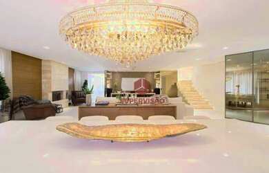 Imagem: A casa em condomínio possui 5 Dormitórios, 5 Banheiros, 4