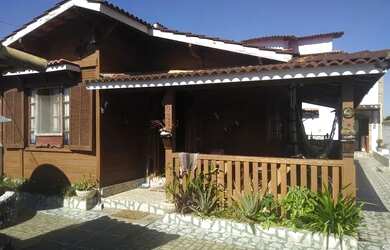 Imagem: A casa possui 2 Dormitórios, 3 Vagas na garagem e está localizado