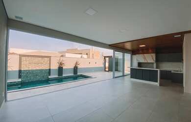 Imagem: A casa em condomínio possui 4 Dormitórios, 5 Banheiros, 288m²