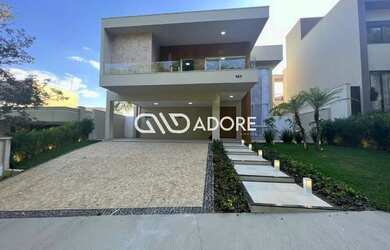 Imagem: A casa em condomínio possui 4 Dormitórios, 5 Banheiros, 4