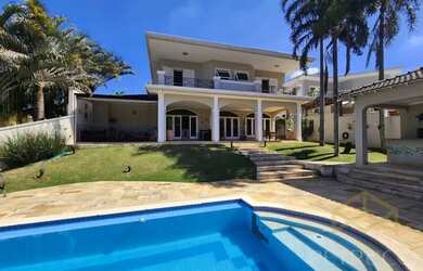 Imagem: A casa em condomínio possui 4 Dormitórios, 5 Banheiros, 4