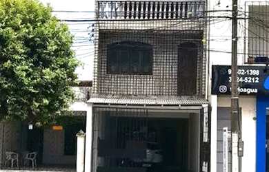 Imagem: A casa possui 4 Dormitórios, 5 Banheiros, 2 Vagas na garagem