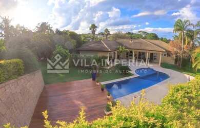 Imagem: A casa possui 1 Dormitório, 1 Banheiro, 5 Vagas na garagem