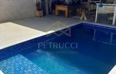 Imagem: A casa possui 4 Dormitórios, 4 Banheiros, 4 Vagas na garagem