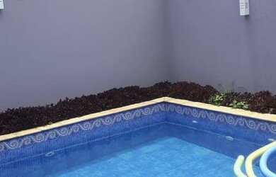 Imagem: A casa em condomínio possui 4 Dormitórios, 5 Banheiros, 3