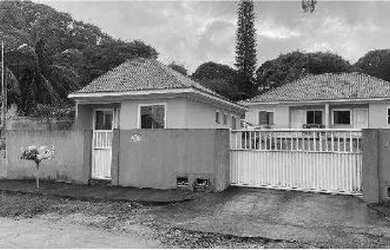 Imagem: A casa possui 2 Dormitórios, 1 Banheiro, 1 Vaga na garagem