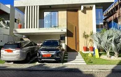 Imagem: A casa em condomínio possui 5 Dormitórios, 5 Banheiros, 2