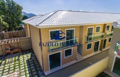 Imagem: A casa possui 2 Dormitórios, 1 Banheiro, 1 Vaga na garagem