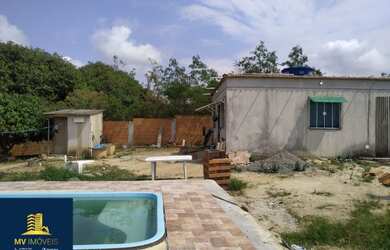 Imagem: A casa possui 2 Dormitórios, 1 Banheiro, 2 Vagas na garagem