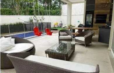 Imagem: A casa em condomínio possui 4 Dormitórios, 5 Banheiros, 4