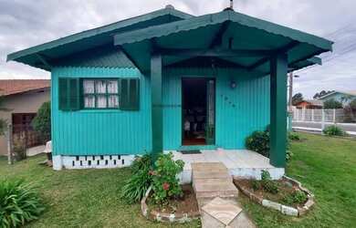 Imagem: A casa possui 3 Dormitórios, 1 Banheiro, 1 Vaga na garagem