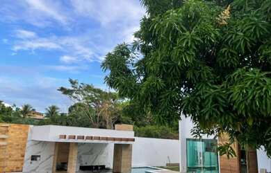 Imagem: A casa possui 2 Dormitórios, 3 Banheiros, 3 Vagas na garagem