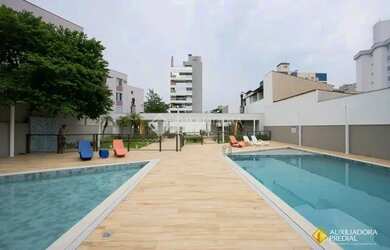 Imagem: O apartamento possui 2 Dormitórios, 3 Banheiros, 2 Vagas na