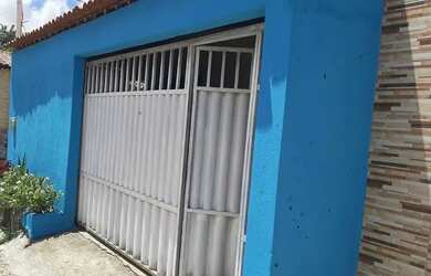 Imagem: A casa possui 2 Dormitórios, 2 Banheiros e 1 Vaga na garagem