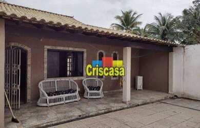 Imagem: A casa possui 3 Dormitórios, 4 Banheiros, 3 Vagas na garagem