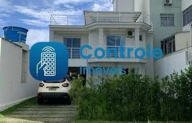 Imagem: A casa possui 3 Dormitórios, 3 Banheiros, 2 Vagas na garagem