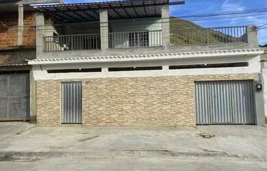 Imagem: A casa possui 2 Dormitórios, 1 Banheiro, 3 Vagas na garagem