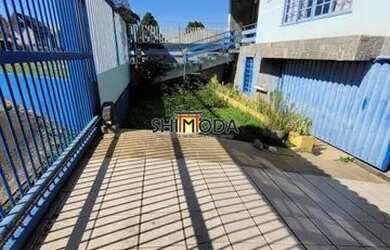 Imagem: A casa possui 5 Dormitórios, 5 Banheiros, 4 Vagas na garagem