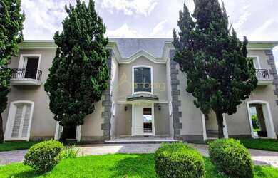 Imagem: A casa em condomínio possui 4 Dormitórios, 5 Banheiros, 5