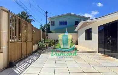 Imagem: A casa possui 3 Dormitórios, 3 Banheiros, 5 Vagas na garagem