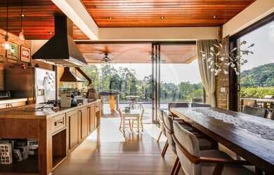 Imagem: A casa em condomínio à venda possui 4 Dormitórios, 5 Banheiros