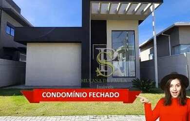 Imagem: A casa possui 3 Dormitórios, 5 Banheiros, 2 Vagas na garagem