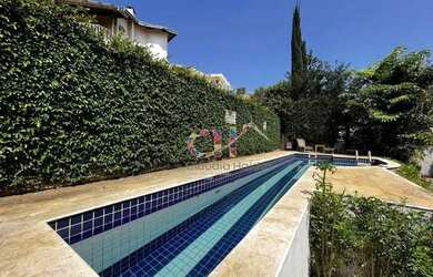 Imagem: A casa em condomínio possui 4 Dormitórios, 5 Banheiros, 4