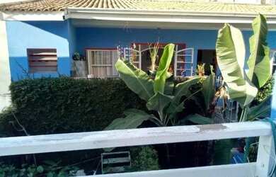 Imagem: A casa possui 4 Dormitórios, 4 Banheiros, 4 Vagas na garagem