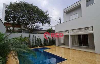 Imagem: A casa em condomínio possui 4 Dormitórios, 5 Banheiros, 4