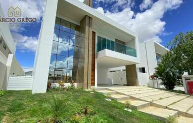 Imagem: A casa em condomínio possui 5 Dormitórios, 5 Banheiros, 4