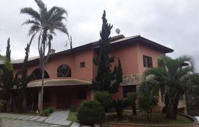 Imagem: A casa possui 5 Dormitórios, 5 Banheiros, 5 Vagas na garagem