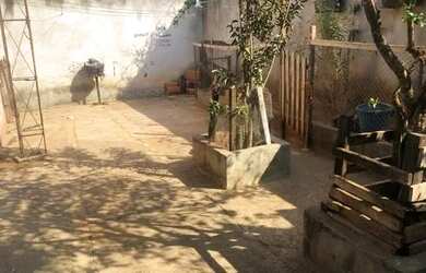 Imagem: A casa possui 3 Dormitórios, 2 Banheiros, 4 Vagas na garagem