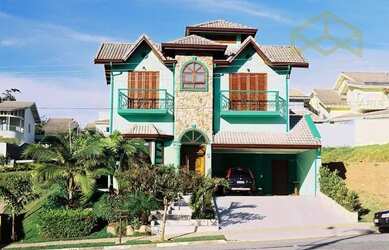 Imagem: A casa em condomínio possui 5 Dormitórios, 5 Banheiros, 4