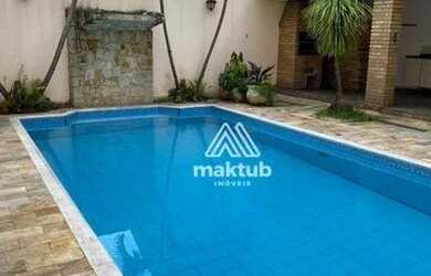 Imagem: A casa possui 4 Dormitórios, 5 Banheiros, 5 Vagas na garagem