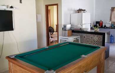 Imagem: A casa possui 3 Dormitórios, 3 Banheiros, 5 Vagas na garagem