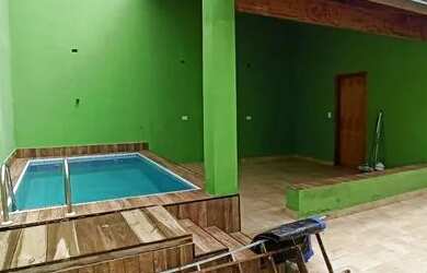 Imagem: A casa possui 2 Dormitórios, 3 Banheiros, 2 Vagas na garagem