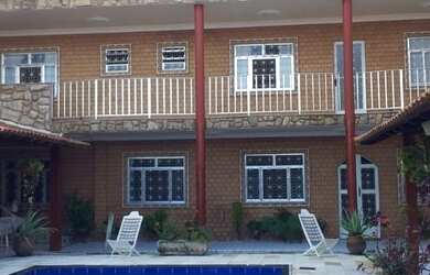 Imagem: A casa possui 5 Dormitórios, 5 Banheiros, 5 Vagas na garagem